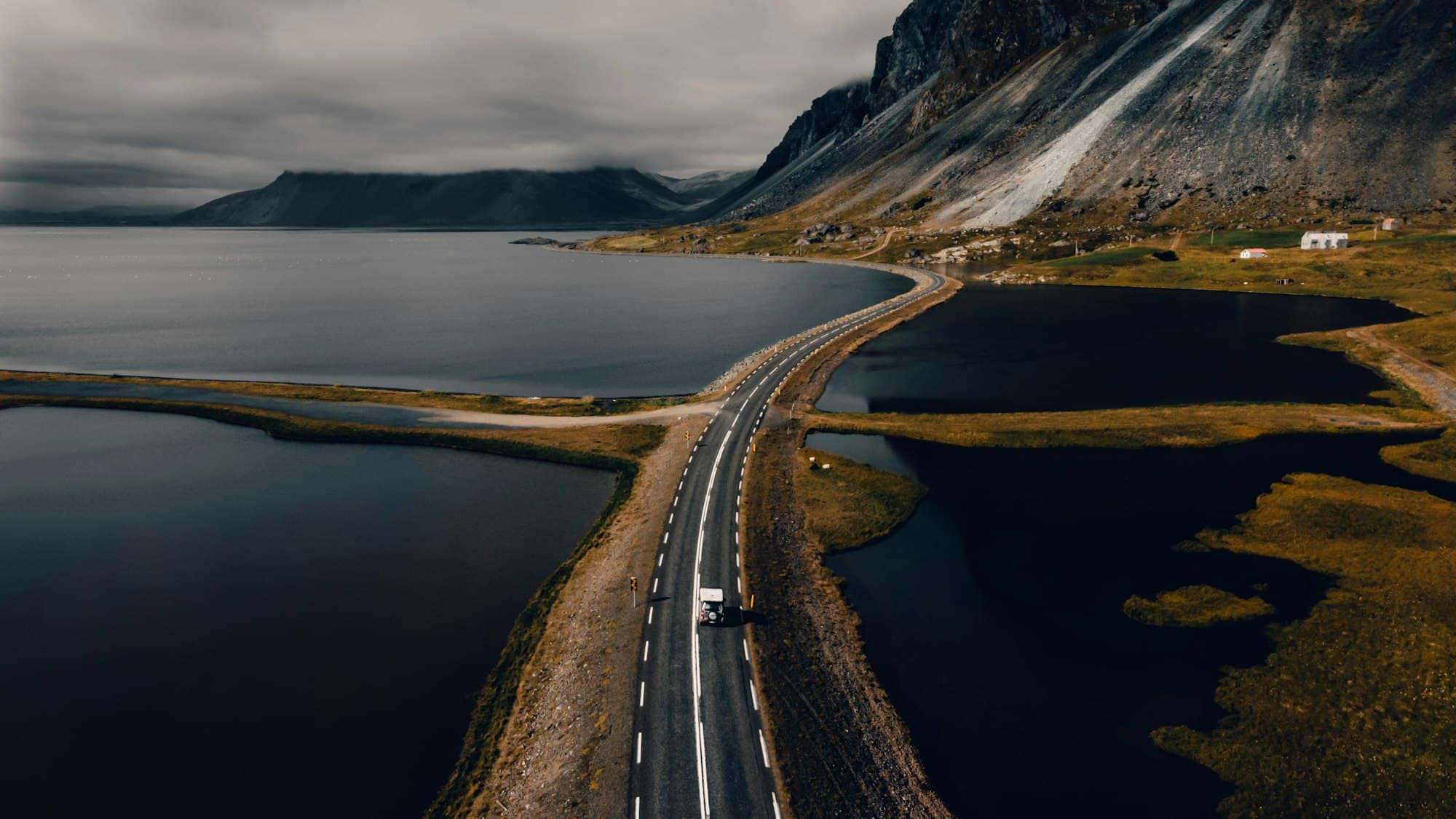 Aerial view of Iceland's ring road winding along a fjord